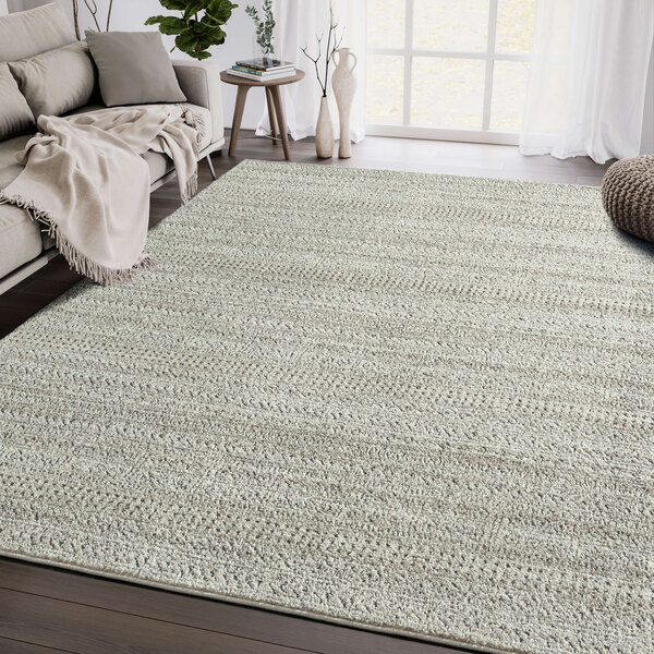 An Abani Cabo Collection cream and gray striped area rug with a white background.