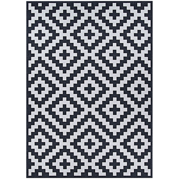A Couristan Afuera Diatomic runner rug with a black and white geometric pattern.