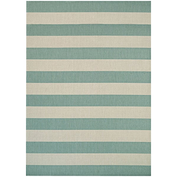 A close up of a Couristan Afuera Yacht Club runner rug with aqua and white stripes.