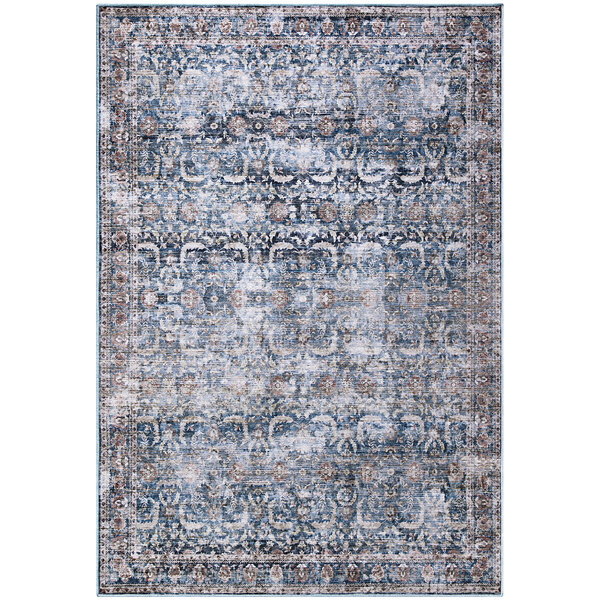 An Abani Lola blue and brown area rug with an ornate pattern.