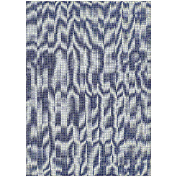 A navy blue area rug with a checkered pattern in blue and white.