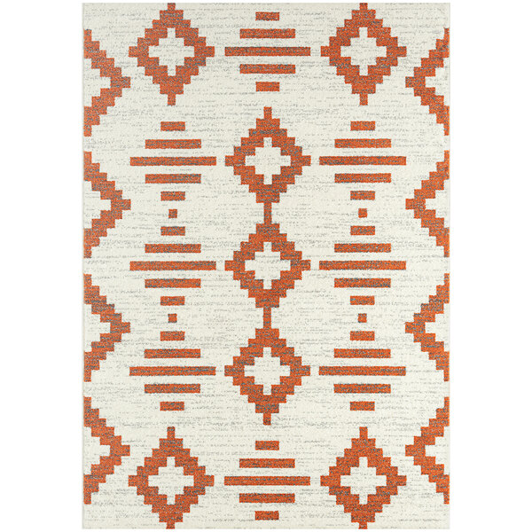 An Abani Casa Collection orange and white geometric area rug.