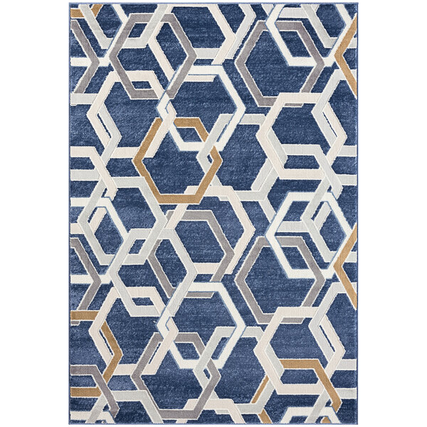 A blue and gray rug with hexagons on it.