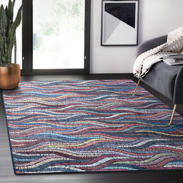 A multicolor Abani Parker Collection area rug with a woven ropes pattern.