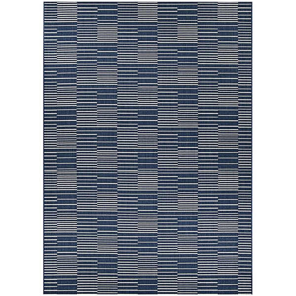 A close up of a Couristan Afuera Regatta marine and shell blue and white striped area rug.