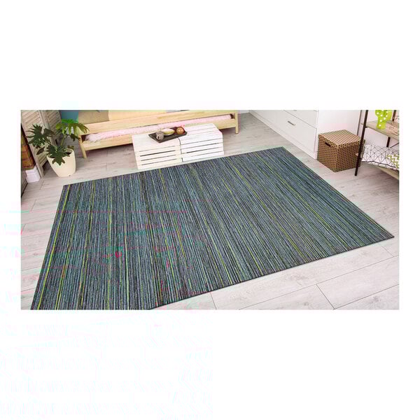A Couristan teal and cobalt blue striped runner rug on the floor in a room.