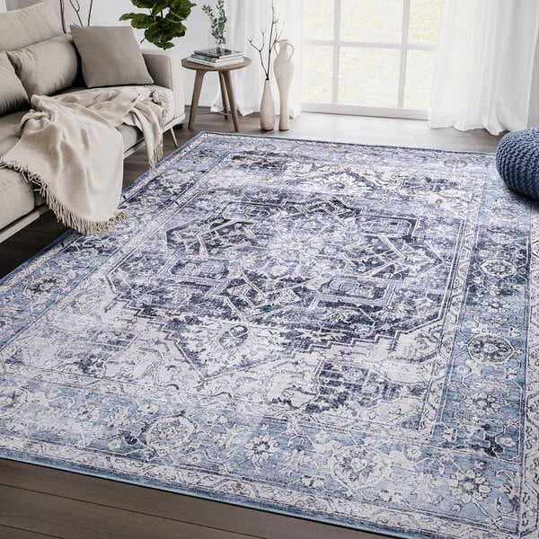 An Abani Lola blue and grey vintage medallion area rug.