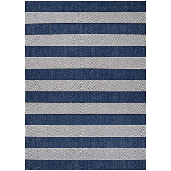 A close up of a Couristan Afuera Yacht Club blue and white striped area rug with blue and grey stripes.