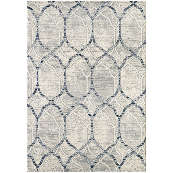 An Abani Arto Collection rug with a cream and grey geometric trellis pattern.