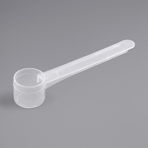 A 7.5 cc polypropylene measuring spoon with a long handle.