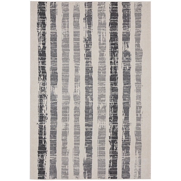 An Abani Casa Collection faded striped Moroccan area rug with black and white stripes.