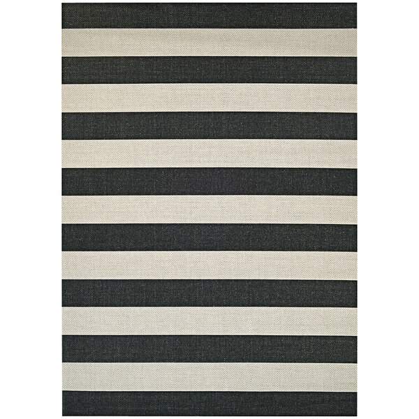 A black and white striped Couristan area rug with a white border.