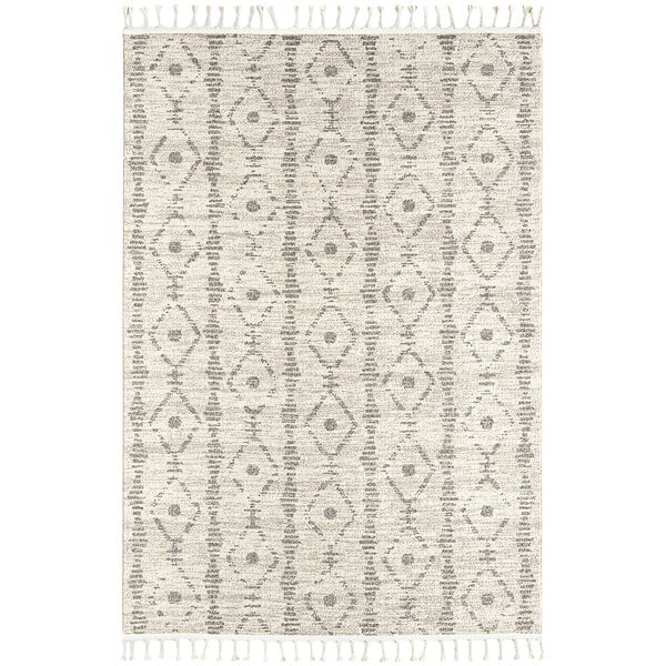 An Abani Layla Collection farmhouse area rug in beige and brown with a diamond pattern and fringes.