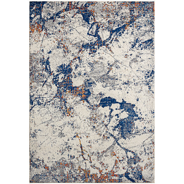 A white area rug with blue and orange abstract spots.