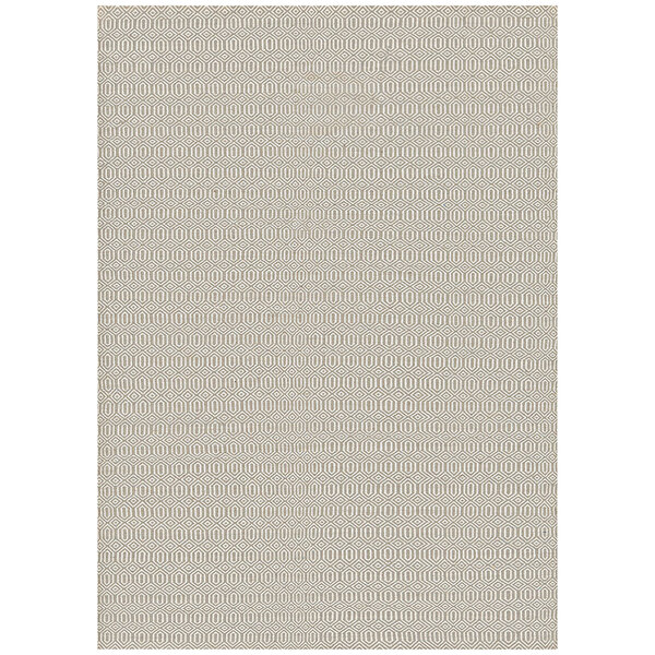 A close up of the caramel Couristan Cottages Southport area rug with small dots.