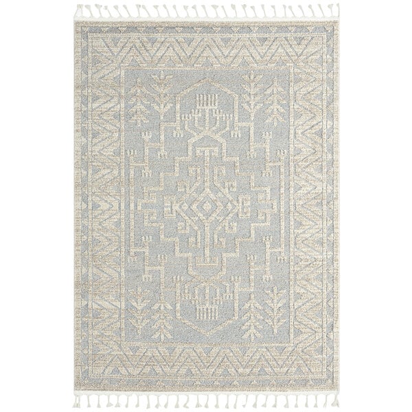 A close up of an Abani Cabo Collection Cream and Gray rug with a geometric medallion pattern.