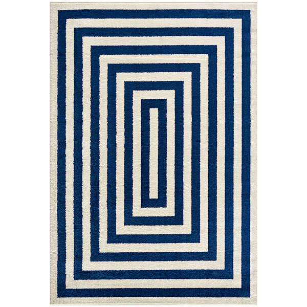 A navy and cream area rug with a geometric design.