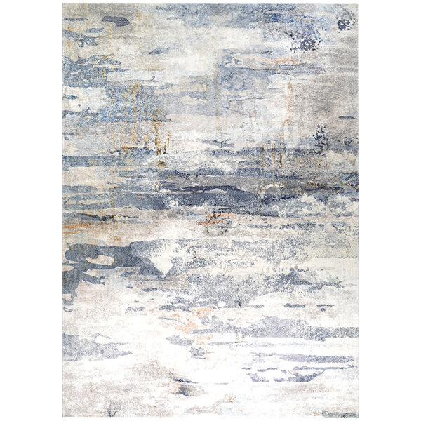 A Couristan Dreamscape Horizon area rug with a blue and grey abstract design.