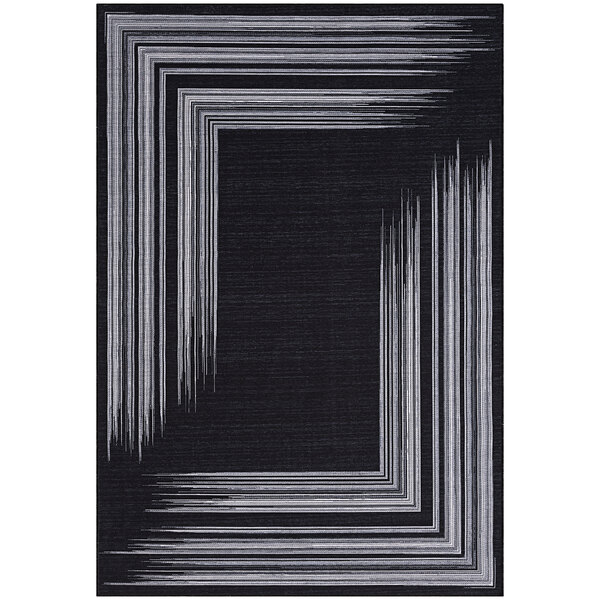 An Abani Parker Collection cream and gray rectangular area rug with a geometric design.