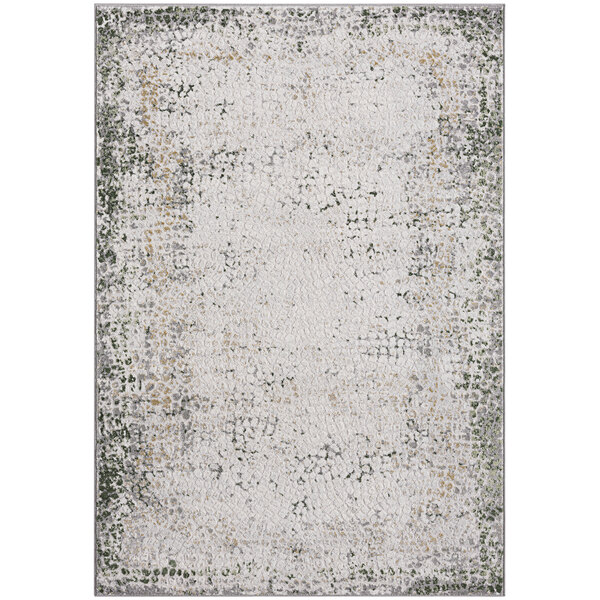 A green, grey, and white contemporary area rug with a distressed design.