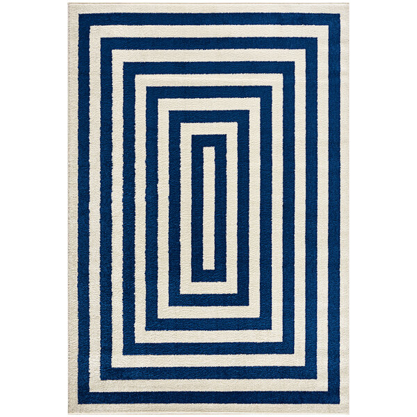 An Abani Casa Collection navy and cream area rug with a geometric design in blue and white.