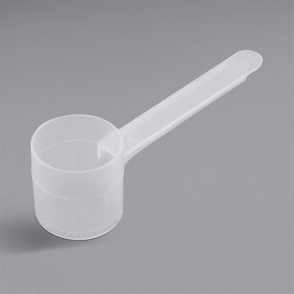 A white plastic scoop with a long handle.