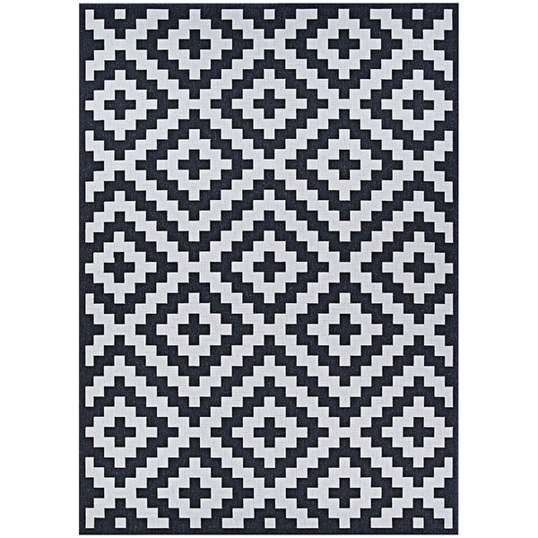 A Couristan Afuera Diatomic area rug with a black and white geometric pattern.