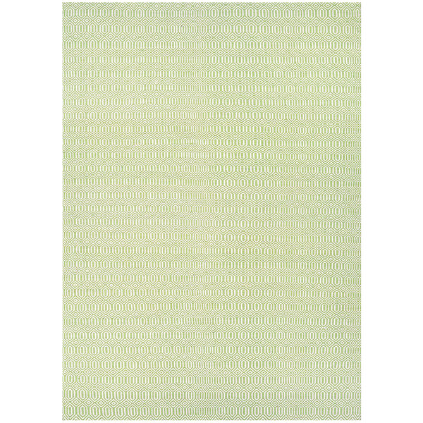 A Couristan Cottages Southport area rug with a green background and white dots.