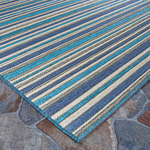 A close-up of a Couristan Cape Brockton cobalt and teal striped area rug.