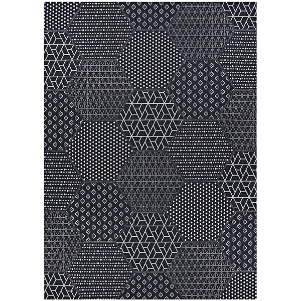 A black and white hexagon patterned Couristan Afuera Anode runner rug.