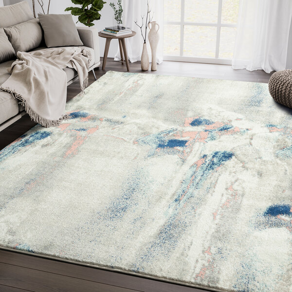 An Abani Arto Collection gray area rug with abstract paint strokes in blue, pink and white.