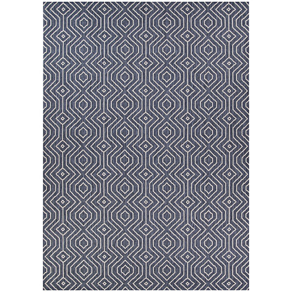 A Couristan Afuera Actinide area rug with a geometric pattern in blue and grey.
