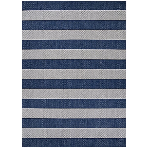 A close up of a Couristan Afuera Yacht Club blue and white striped area rug with blue and grey stripes on a white background.