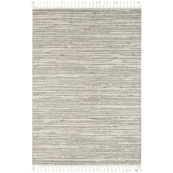 An Abani Layla Collection beige and brown linear area rug with fringes.