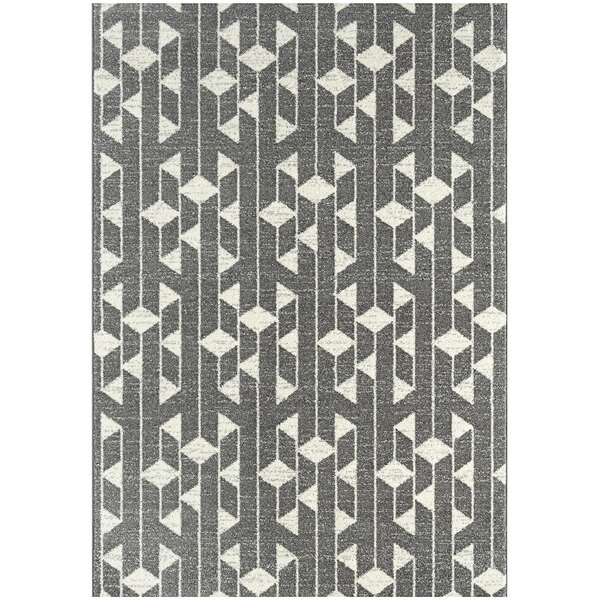 A cream and grey rectangular area rug with geometric patterns including triangles.