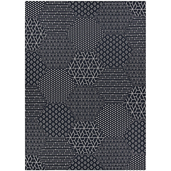 A black and white hexagon patterned Couristan Afuera Anode area rug.