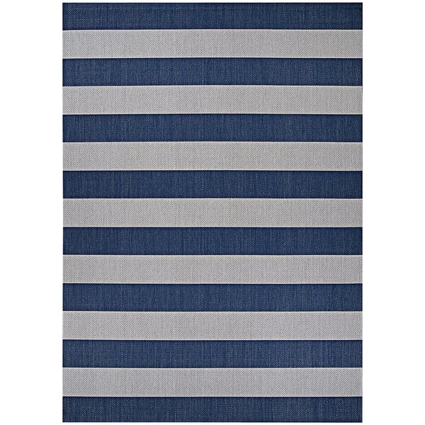 A close up of a Couristan Afuera Yacht Club Midnight Blue / Ivory striped area rug.