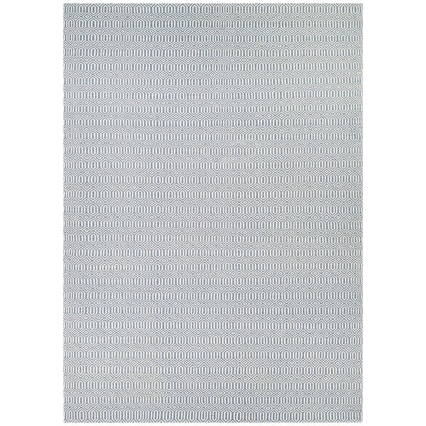 A close-up of a Couristan Southport runner rug with a light blue and white dot pattern.