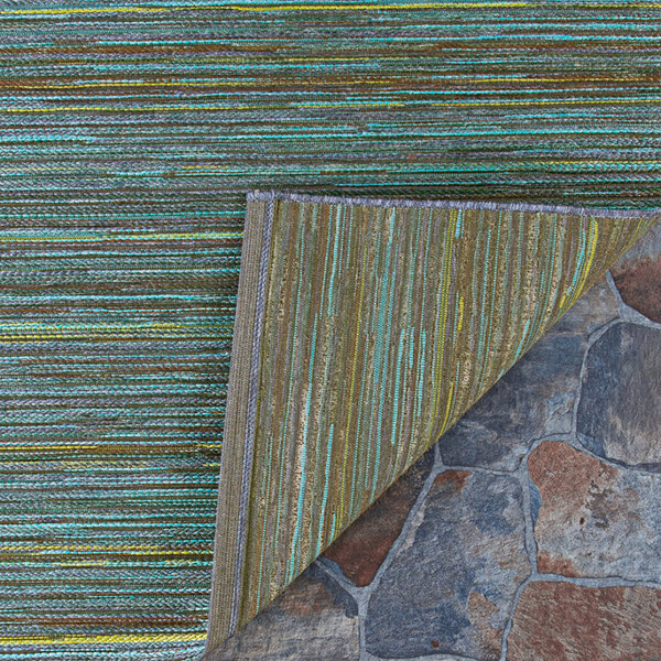 A Couristan teal and cobalt area rug with a green and blue stripe pattern.
