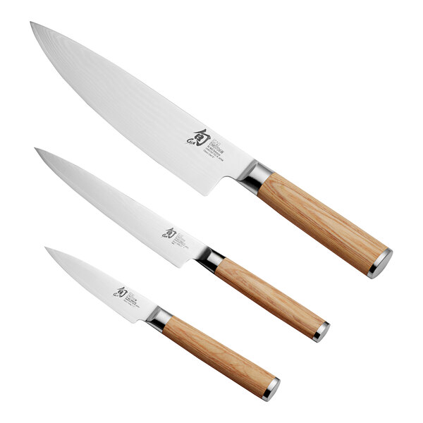 A Shun Classic 3-piece knife set with wooden handles.