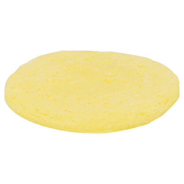 A yellow round Papetti's scrambled egg patty on a white background.