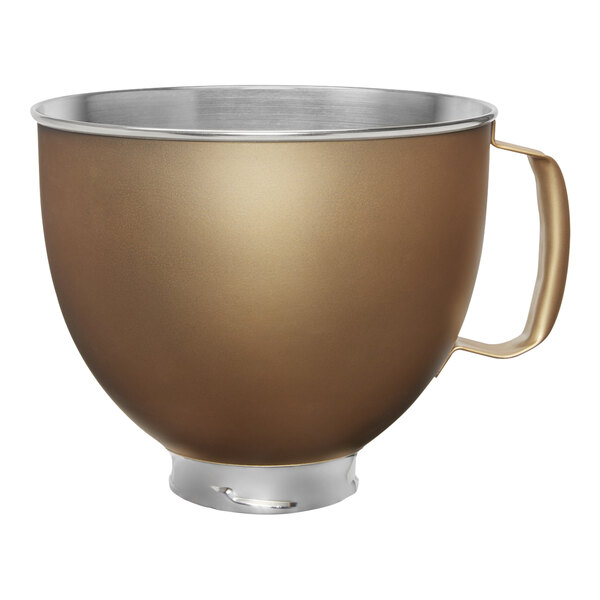 A metallic stainless steel KitchenAid mixing bowl with a handle.