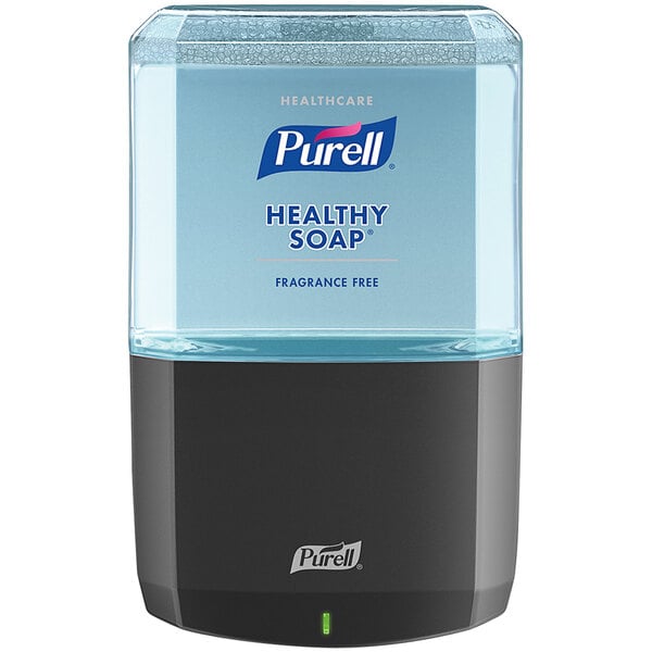 A Purell® graphite gray automatic soap dispenser with a black and grey label on a bottle of blue Purell® healthy soap.