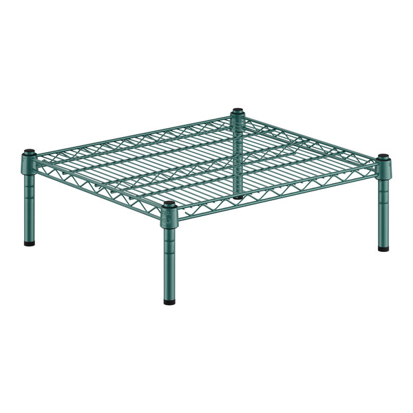 A green metal Regency wire shelf with black metal rods.