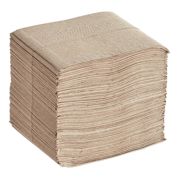 A large stack of Tork Xpressnap natural kraft dispenser napkins.