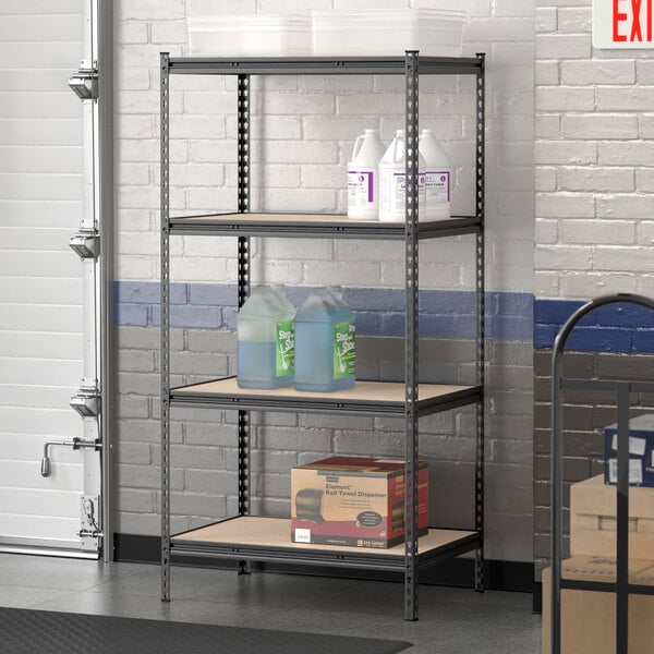 A Lavex black metal boltless shelving unit with containers and boxes on the shelves.