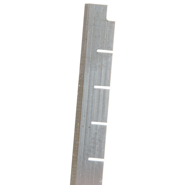 A metal blade with square holes in it.