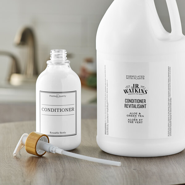 A white plastic bottle of JR Watkins Aloe and Green Tea Conditioner with a white label.