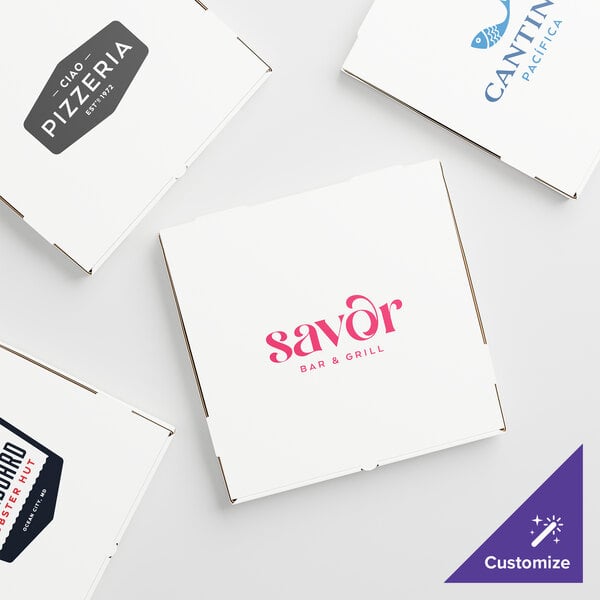 A set of customizable white corrugated pizza boxes with various restaurant logos printed on the lids.