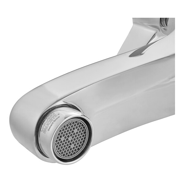 A Chicago Faucets deck-mounted faucet with cross handles in chrome.